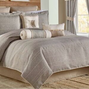 Croscill queen comforter with 2 shams.  Bedskirt not included.color neutral.